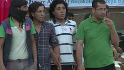 CLEAN : Syrian refugees celebrate Iftar on Turkey border News Clip