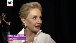 Carolina Herrera waves to the crowd at New York Fashion Week where she showed off her spring/summer 2015 collection. (Sept. 8) News Clip