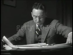 1935: U.S. FORTUNE SURVEY: CU Tabulating machine. INT MS Assistant & Fortune Editor Eric Hodgins (1899-1971) at desk. MS Elmo Roper at desk. CU Writing questions. REPRISAL: INT VS Hodgins & Roper talking (SOT) about polling the Presidential elections. Instructional Video