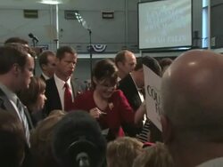 2008 CU ZO MS Republican Vice-presidential candidate Governor Sarah Palin and her husband Todd Palin signing autographs at presidential campaign event on September 9, 2008 / Lancaster, Pennsylvania, USA / AUDIO Stock Footage