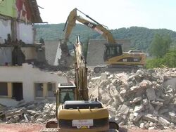 MS Demolition of apartment block / Saarburg, Rhineland-Palatinate, Germany Stock Footage