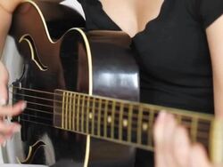 Girl playing acoustic guitar. Stock Footage