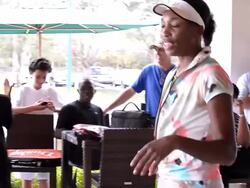 Venus Williams visits children at First Serve Stock Footage