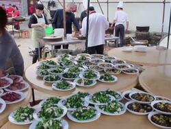 SWITH PAN WS Chinese food in outdoor kitchen of a Wedding/xian,shaanxi,China Stock Footage