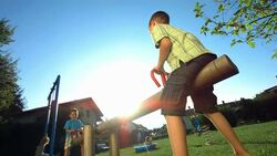 HD Super Slow-Mo: Little Boys Playing On A Seesaw Stock Footage