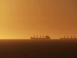 HD: Industrial Ships At Sunset Stock Footage