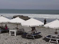  MS Shot of open air restaurant at echo beach, surfing beach at batubelig, Asia AUDIO / Seminyak, Bali, Indonesia Stock Footage