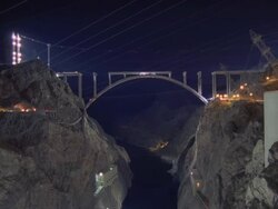  WS T/L View of Hoover Dam near bridge under construction at night / Mojave, California, USA Stock Footage