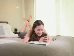 Beautiful Asian Woman text messages Stock Footage