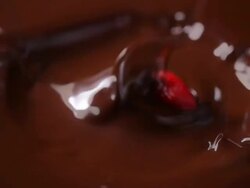Strawberry dipping into a liquid chocolate  Stock Footage