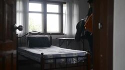 Young man traveler in the hostel Stock Footage