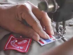 Badges sewn shirt. Stock Footage