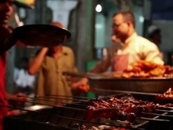 MS Chefs making kebabs at food stall / Delhi, Delhi, India Stock Footage
