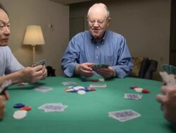 Senior Man Wins at Card Game Stock Footage