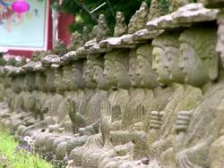 MS Shot of group of buddha at gwaneumsa / Jeju, Jeju-do, South Korea Stock Footage