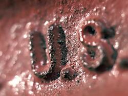 "U.S.A." shown in raised lettering on metal surface. Stock Footage