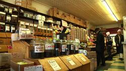 Customers being served in specialist coffee shop News Clip