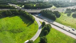 Traffic On Cloverleaf Interchange Stock Footage
