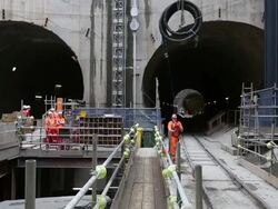 Long shot of thick rubber cables being craned down Stock Footage
