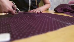 HD: Tailor Cutting Textile For A Dress Stock Footage