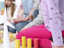 HD: Children Making Paper Wind Turbine in a Kindergarden. Stock Footage