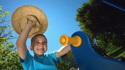 HD Super Slow-Mo: Little Boy Riding A Spring Horse Stock Footage