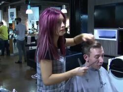 Men having their hair cut in a barber shop in Glasgow News Clip