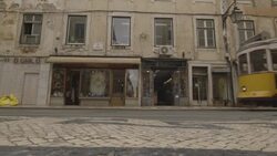 Lisbon Tram Bus through Town Stock Footage