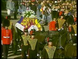 September 6, 1997 FILM MONTAGE MS Carriage with Princess Diana's casket and guards passing in front of spectators/ MS casket and flowers/ CU Flowers with card signed 'Mummy'/ London, England/ AUDIO Stock Footage