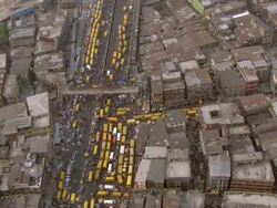 WS AERIAL View of yellow cabs moving on freeway / Lagos, Nigeria Stock Footage