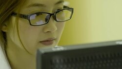 CLose up woman laboratory working on a computer Stock Footage