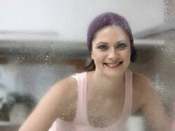 HD DOLLY: Portrait Of A Woman Doing Housework Stock Footage