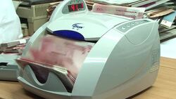 CLEAN: File footage of currencies including yuan, yen, dollar News Clip