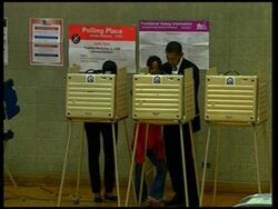 Barack and Michelle Obama vote in Chicago, 2 News Clip
