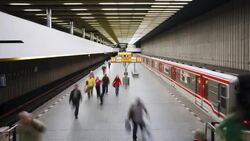 Commuters wait on an underground train platform. Stock Footage