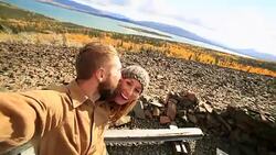 Traveling young couple taking selfie on mountain Stock Footage