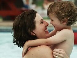mother and son at a water park Stock Footage