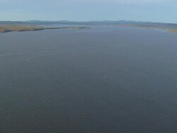 WS AERIAL PAN ZI View of boat floating at Castine bay / Maine, United States Stock Footage