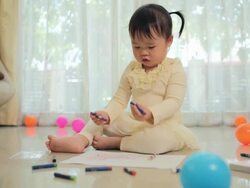 Asian baby girl painting Stock Footage