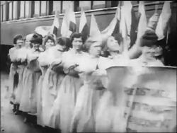 B/W 1917 suffragists marching past train with hands on shoulders / Washington, D.C. / newsreel Stock Footage