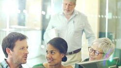 Business people at computer in computer lab Stock Footage