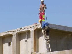 MS Worker getting down from ladder deconstruction of bridge over river Mosel / Wellen, Rhineland Palatinate, Germany Stock Footage