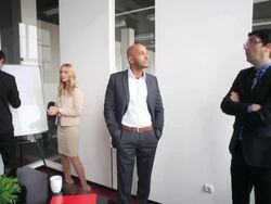 Team of architects going over blueprints Stock Footage