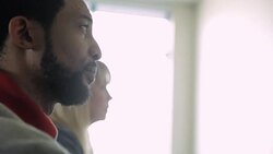 Attentive college students with digital tablet listening in classroom Stock Footage