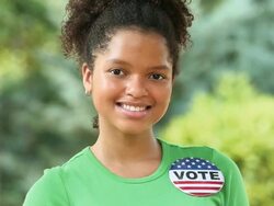 MS Portrait of Smiling Teenager Wearing VOTE Button / Richmond, Virginia, USA Stock Footage