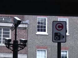 (HD1080i) Traffic Control, Climate Change: Congestion Camera, Sign - Push Stock Footage