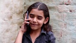 Little Girl Talking on Smartphone Stock Footage