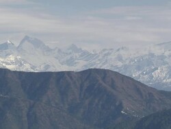 WS PAN Rugged Green hills and snowy mountain range / India Stock Footage