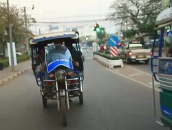 MS SLO MO POV Vehicles moving on street/ Vientiane, Laos Stock Footage
