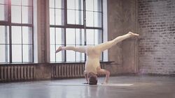 Young Woman Doing Yoga Meditation and Stretching Exercises Stock Footage